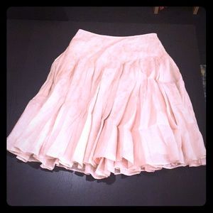 Light pink with embossed flower patterned skirt